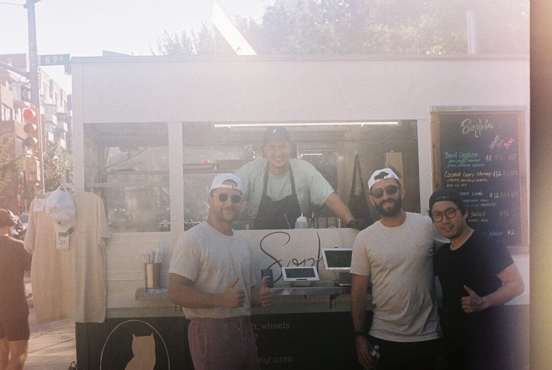 The Sophia crew in front of the food cart
